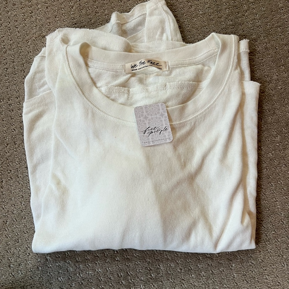 A white womens sweatshirt/pancho